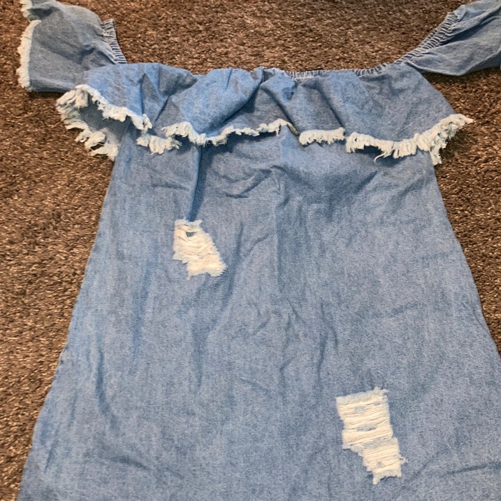 never worn . denim dress with patching .